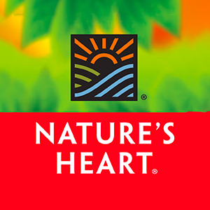 logo da marca nature's heart em branco no fundo vermelho e ilustração de folhagens acima