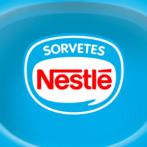 logo da marca sorvetes nestlé em vermelho, dentro de forma circular, em fundo azul claro